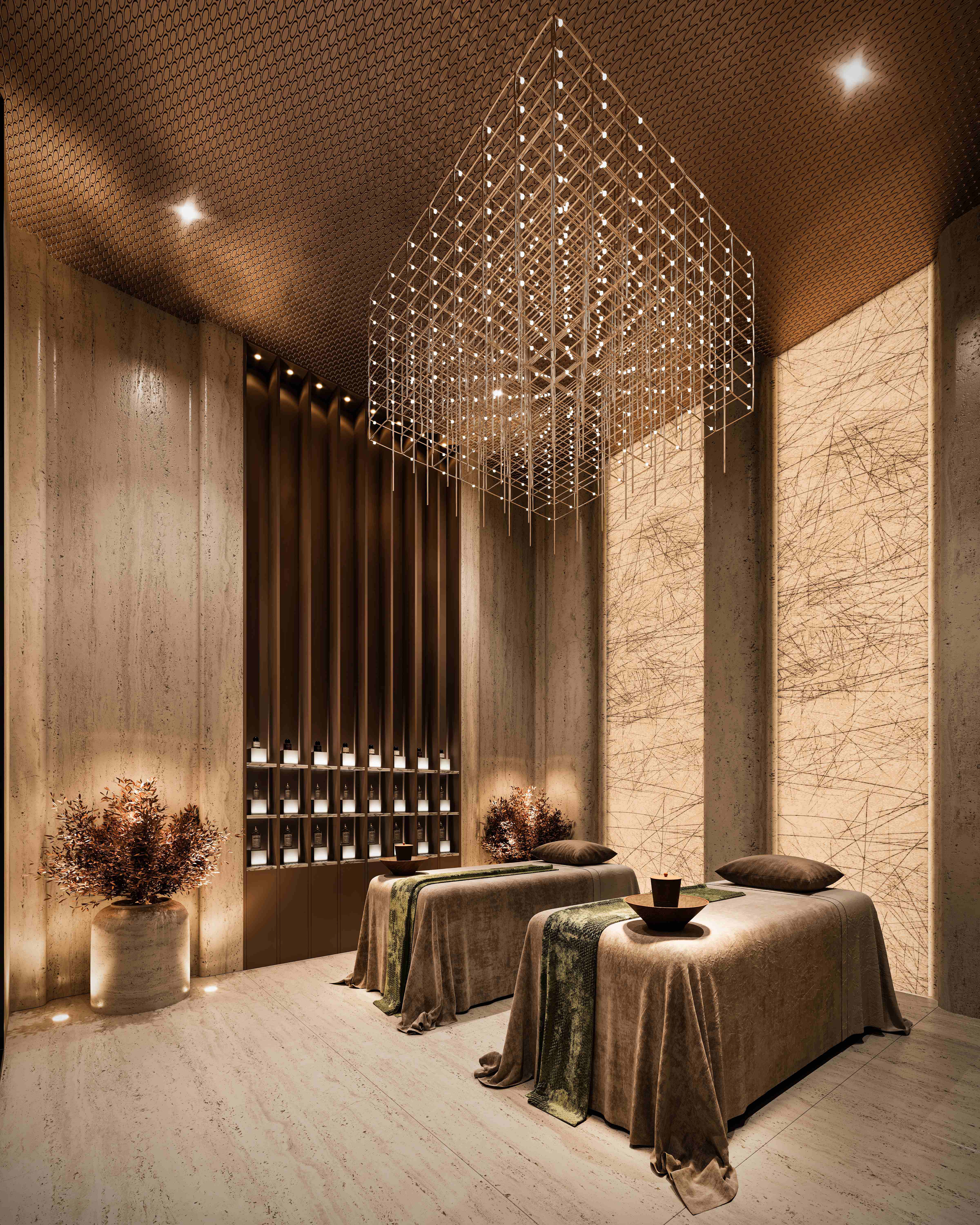 Luxury spa treatment room with dual massage beds and geometric ceiling